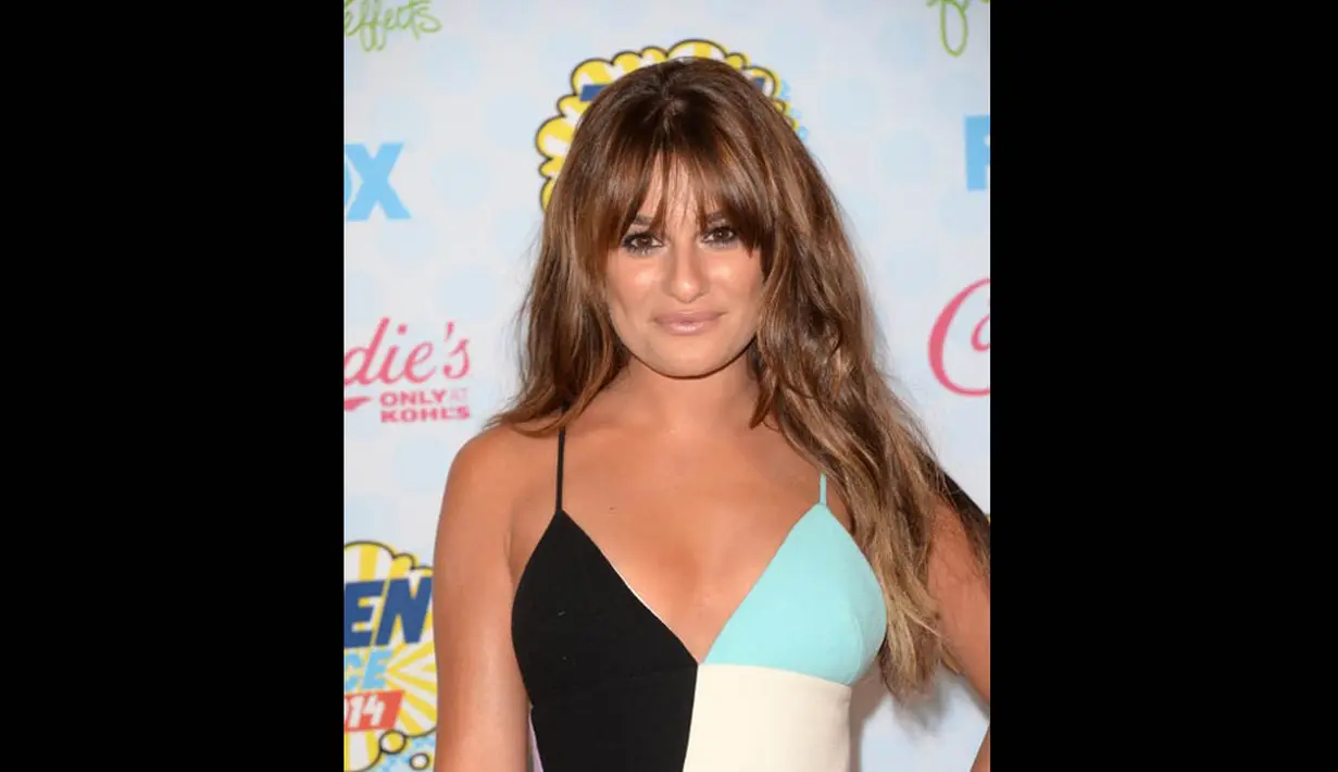 Dengan riasan wajah yang tidak terlalu mencolok, Lea Michele tampil begitu menawan, Los Angeles, Minggu (10/8/14). (Jason Merritt/Getty Images/AFP)