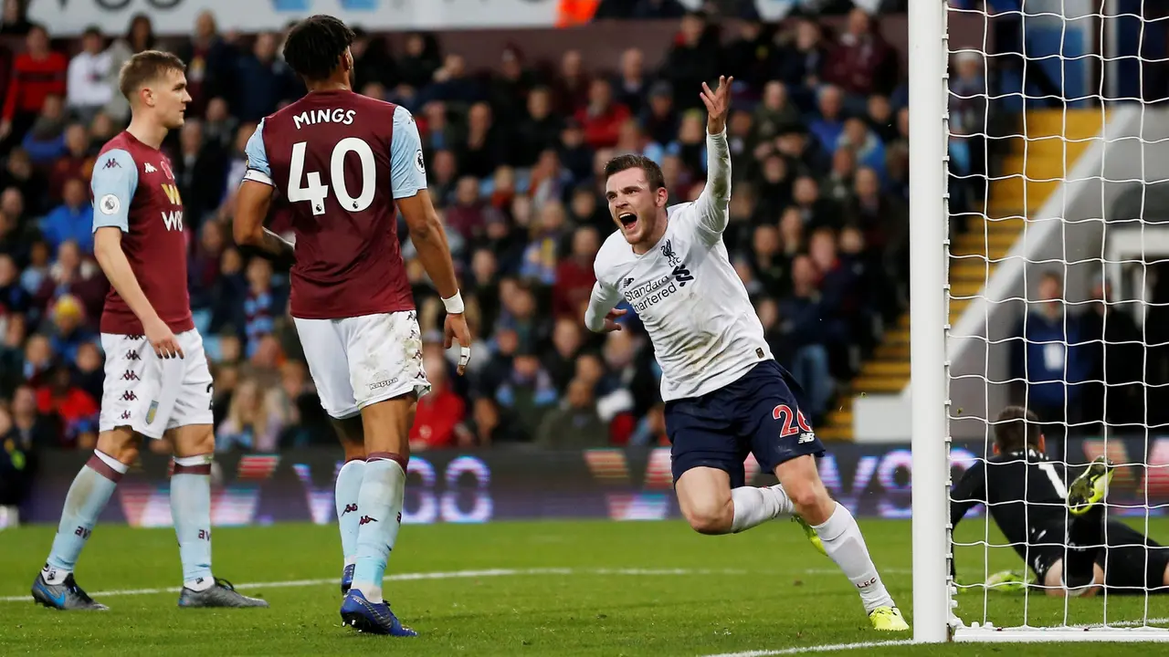 Selebrasi pemain Liverpool Andrew Robertson