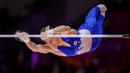 Pesenam asal Rusia, Daniel Marinov beraksi pada nomor palang tunggal final aparatus putra Kejuaraan Dunia Gimnastik 2025 di Indonesia Arena, Senayan, Jakarta, Sabtu (25/10/2025). (Bola.com/Bagaskara Lazuardi)