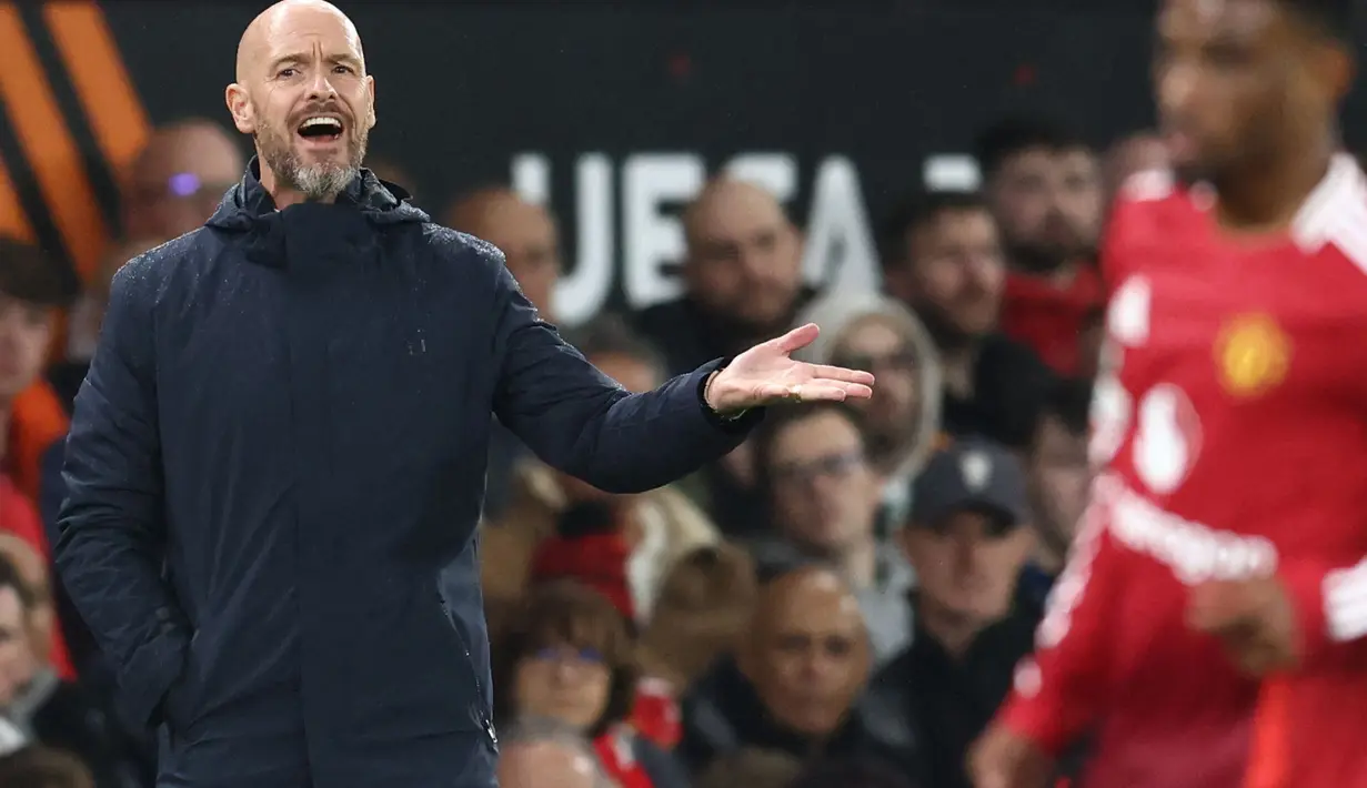 Menjamu FC Twente, Manchester United harus puas berbagi poin usai bermain imbang dengan skor 1-1. (Darren Staples/AFP)
