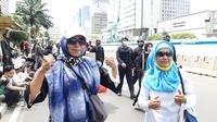 Warga dari Semarang datang untuk ikut aksi Reuni 212 di Jakarta. (Foto: Yopi Makdori/Liputan6.com).