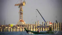 Pelindo II menargetkan pembangunan pelabuhan New Tanjung Priok tahap I dapat beroprasi pada kuartal III 2015 dengan kapasitas daya tampung  sebesar 1,5 juta, Minggu (7/9/2014)(Liputan6.com/Faizal Fanani)