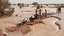 Lebih dari 1.000 hektar lahan pertanian terendam. (GUY PETERSON/AFP)