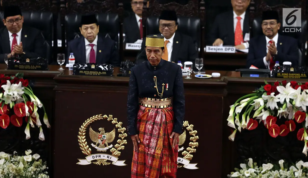 Presiden Jokowi disaksikan Ketua DPR RI Setya Novanto Usai Pidato pada Sidang Tahunan  DPR/DPD di kompleks Parlemen Senayan, Jakarta, Rabu (16/8) Sidang mendengarkan Pidato kenegaraan  Jokowi menyambut HUT ke-72 Kemerdekaan RI. (Liputan6.com/ Johan Tallo)