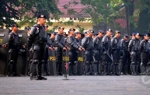 Ratusan personel Brimob mengikuti gelar pasukan pengamanan KAA di Mako Brimob Kelapa Dua, Depok, Selasa (14/5/2015). Sebanyak 3.000 personel Brimob Polri diterjunkan mengawal Konferensi Tingkat Tinggi Asia-Afrika. (Liputan6.com/Yoppy Renato)