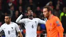 Ekspresi pemain Prancis, Paul Pogba, setelah mencetak gol ke gawang Belanda pada laga Grup A Kualifikasi Piala Dunia 2018 zona Eropa, di Amsterdam ArenA, Selasa (11/10/2016) dini hari WIB. (AFP/Franck Fife)