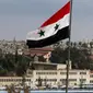 Bendera Suriah (AP/Hassan Ammar)