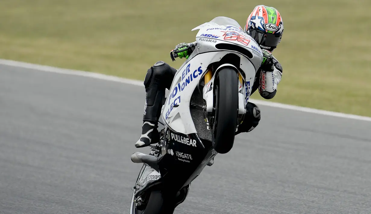 Nicky Hayden - Pemilik nomor 69 ini merupakan pembalap Amerika Serikat terakhir yang bergelar juara dunia MotoGP. Ia berhasil menjadi juara dunia secara dramatis pada 2006, setelah menang poin dari Valentino Rossi pada seri terakhir di GP Valencia. (AFP/Josep Lago)