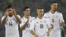 Para pemain Jerman, merayakan kemenangan atas Irlandia Utara pada laga Kualifikasi Piala Dunia 2018 di Stadion Windsor Park, Kamis (5/10/2017). Jerman menang 3-1 atas Irlandia Utara. (AP/Peter Morrison)