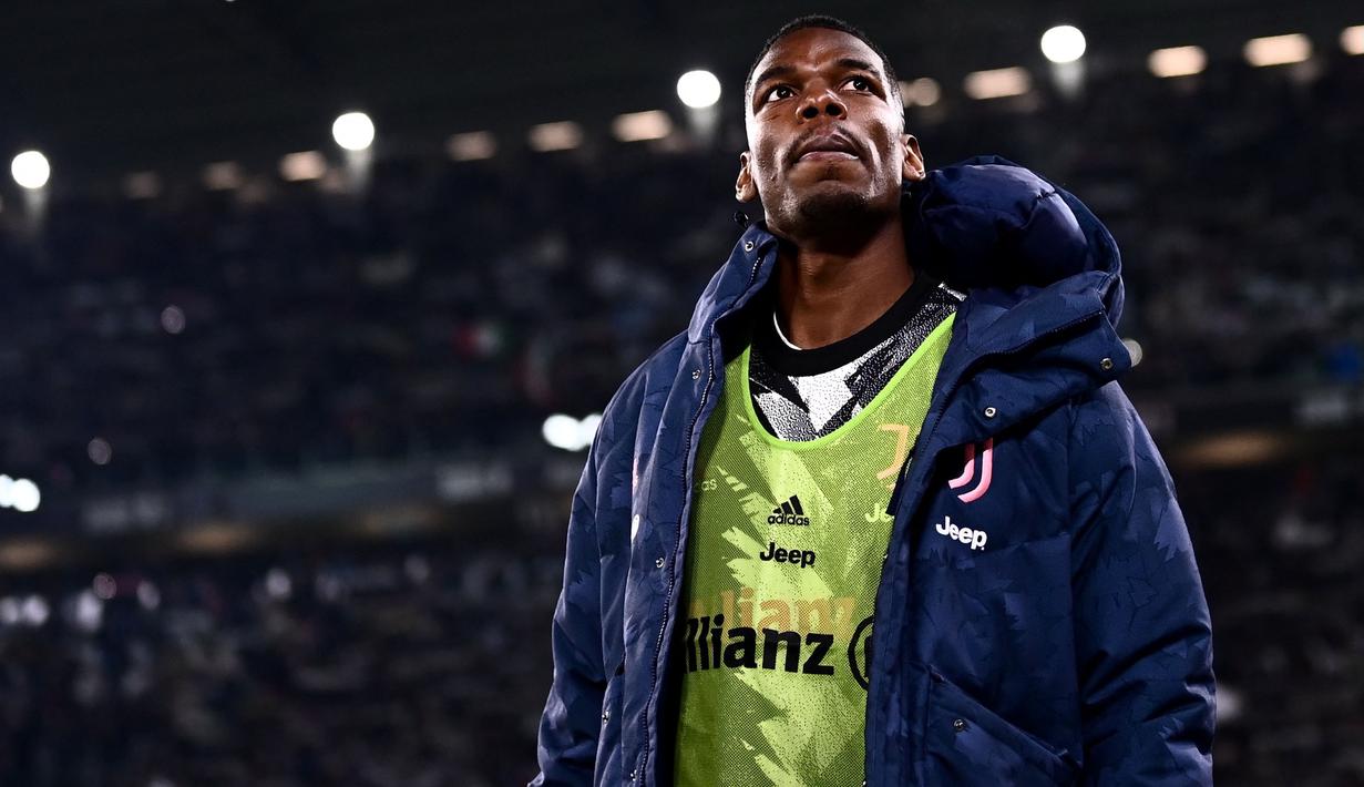 Pemain Juventus, Paul Pogba bersiap melakukan pemanasan sebelum laga lanjutan Liga Italia 2022/2023 melawan Torino yang berlangsung di Allianz Stadium, 28 Februari 2023. (AFP/Marco Bertorello)