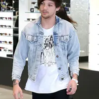 Louis Tomlinson (via dailymail.co.uk)