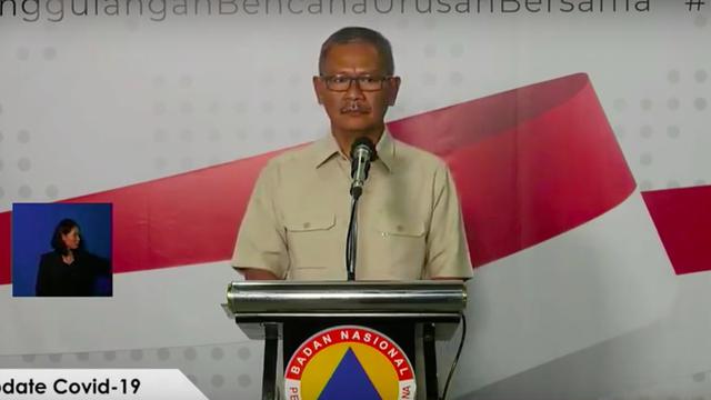 Juru Bicara Pemerintah dalam Penanganan Covid-19 Achmad Yurianto saat menyampaikan keterangan pers di Graha BNPB, Jakarta, Senin (23/3/2020).