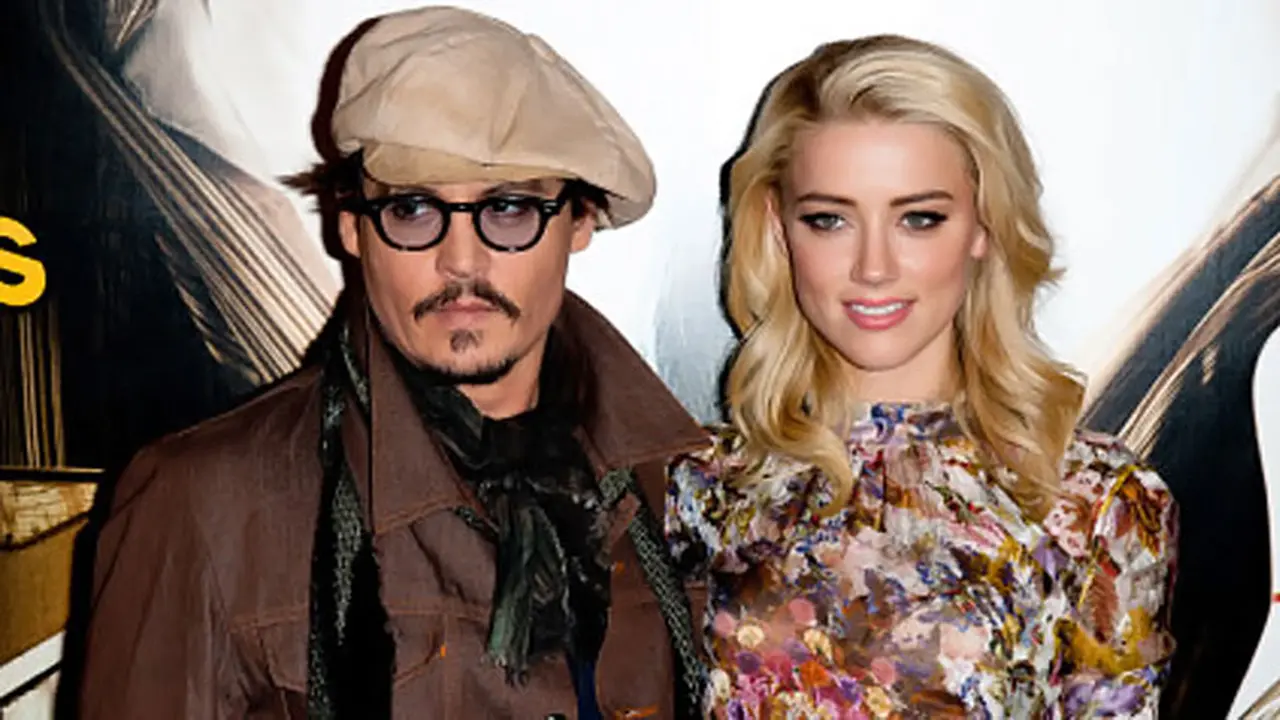 johnny-depp-amber-131230c.jpg