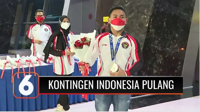 Kepulangan kloter pertama atlet kontingen Indonesia dari Olimpiade Tokyo 2020 disambut Menteri Pemuda dan Olahraga Zainudin Amali di Terminal 3 VIP Bandara Internasional Soekarno Hatta.