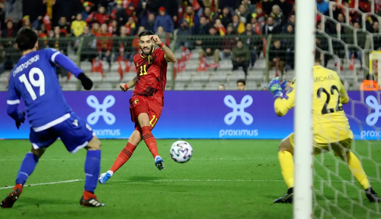 Winger timnas Belgia, Yannick Ferreira Carrasco, mencetak gol keempat untuk timnya ke gawang Siprus pada laga Grup I Kualifikasi Piala Eropa 2020 di Cardiff City Stadium, Selasa (19/11/2019). Timnas Belgia memetik kemenangan telak dengan skor 6-1 kala menjamu Siprus. (AP/Francisco Seco)