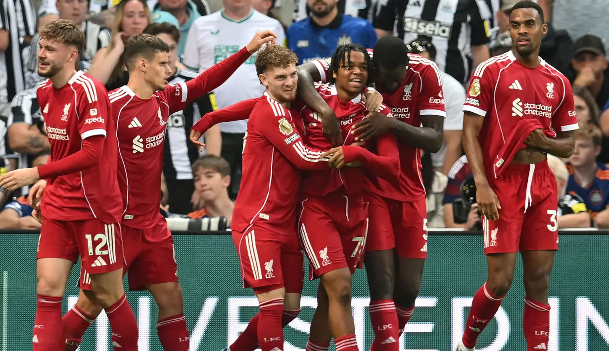 Gol tersebut membuat Liverpool menang 3-2 atas Newcastle. Selain itu, hasil tersebut juga mengantar The Reds bertengger di peringkat tiga klasemen dengan total 6 poin dari dua pertandingan. (AFP/Andy Buchanan)
