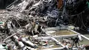 Hujan deras yang mengguyur sejumlah wilayah di Provinsi Bali memicu banjir dan longsor. (SONNY TUMBELAKA/AFP)