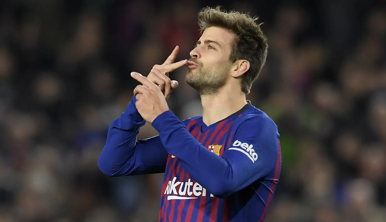 3. Gerard Pique (Spanyol) - Sebesar 500 juta euro dengan kontrak hingga 30 Juni 2022. (Photo by LLUIS GENE / AFP)