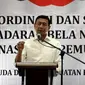 Menko Polhukam, Wiranto memberikan sambutan dalam acara Simposium Nasional Pemuda Indonesia, Jakarta, Rabu (30/8). Acara bertema "Peran strategis Pemuda Indonesia dalam penguatan Pancasila sebagai Bangsa dan Bela Negara". (Liputan6.com/Johan Tallo)