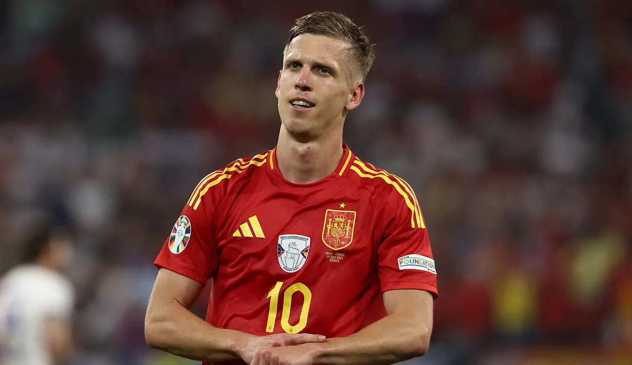 Daniel Olmo merayakan gol bunuh diri Prancis dan gol kedua Spanyol saat laga semifinal Euro 2024 di Arena Sepak Bola Munich di Munich pada 9 Juli 2024. Saat ini, Daniel Olmo sudah mengoleksi tiga gol dan berpeluang meraih gelar pencetak gol terbanyak mengingat Spanyol akan berlaga di final Euro 2024 melawan Inggris. (FRANCK FIFE/AFP)