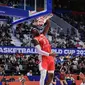 Pebasket Kanada, RJ Barrett melakukan slam dunk pada laga kedua Grup H Piala Dunia FIBA 2023 di Indonesia Arena, Senayan, Jakarta, Minggu (27/08/2023). (Bola.com/Bagaskara Lazuardi)