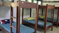 Penampakan kamar tidur ruang isolasi pasien Covid-19 di asrama kampus Akper Blora. (Liputan6.com/Ahmad Adirin)