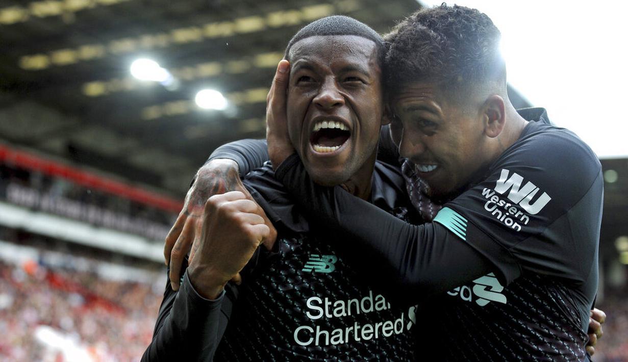 Gelandang Liverpool, Georginio Wijnaldum, melakukan selebrasi usai membobol gawang Sheffield United pada laga Premier League di Stadion Bramall Lane, Sabtu (28/9). Liverpool menang 1-0 atas Sheffield United. (AP/Rui Vieira)