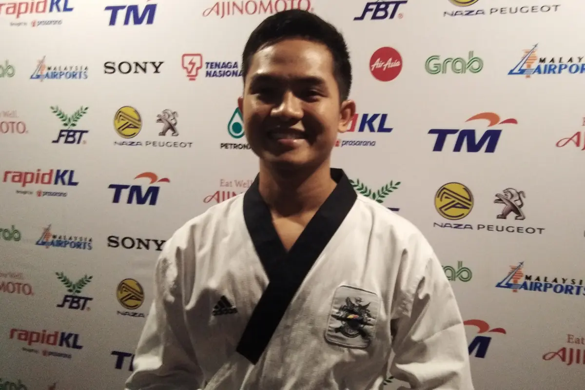 Maulana Khaidir harus puas dengan medali perak nomor poomase taekwondo SEA Games 2017. (Liputan6.com/Cakrayuri Nuralam)