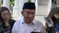 Menteri Koordinator Bidang Pembangunan Manusia dan Kebudayaan (Menko PMK) Muhadjir Effendy di Istana Wapres, Kamis (22/2/2024) (Liputan6.com/Delvira Hutabarat)