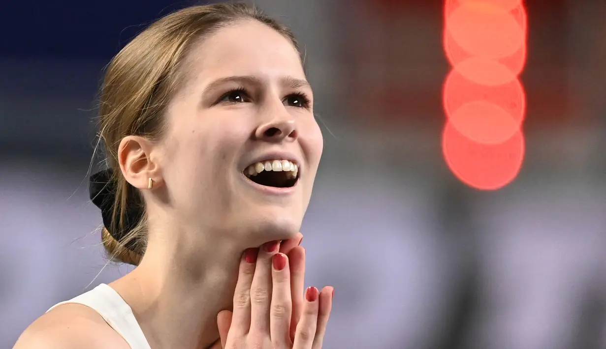 Ekspresi Pia Skrzyszowska dari Polandia saat perlombaan lari gawang 60m putri dalam Kejuaraan Atletik Indoor Eropa 2021 di Torun. (Foto: AFP/Sergei Gapon)