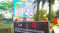 Pecinta satwa berunjuk rasa mengecam pentas lumba-lumba di Pekanbaru. (Liputan6.com/M Syukur)