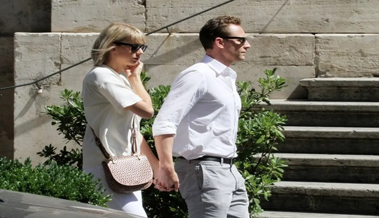 Tom Hiddleston sedang berada di Australia untuk keperluan syuting film terbarunya, Thor: Ragnarok. Ia akhirnya angkat bicara tentang tingkah laku Taylor Swift yang sedikit 'nakal'. (Dailymail/Bintang.com)