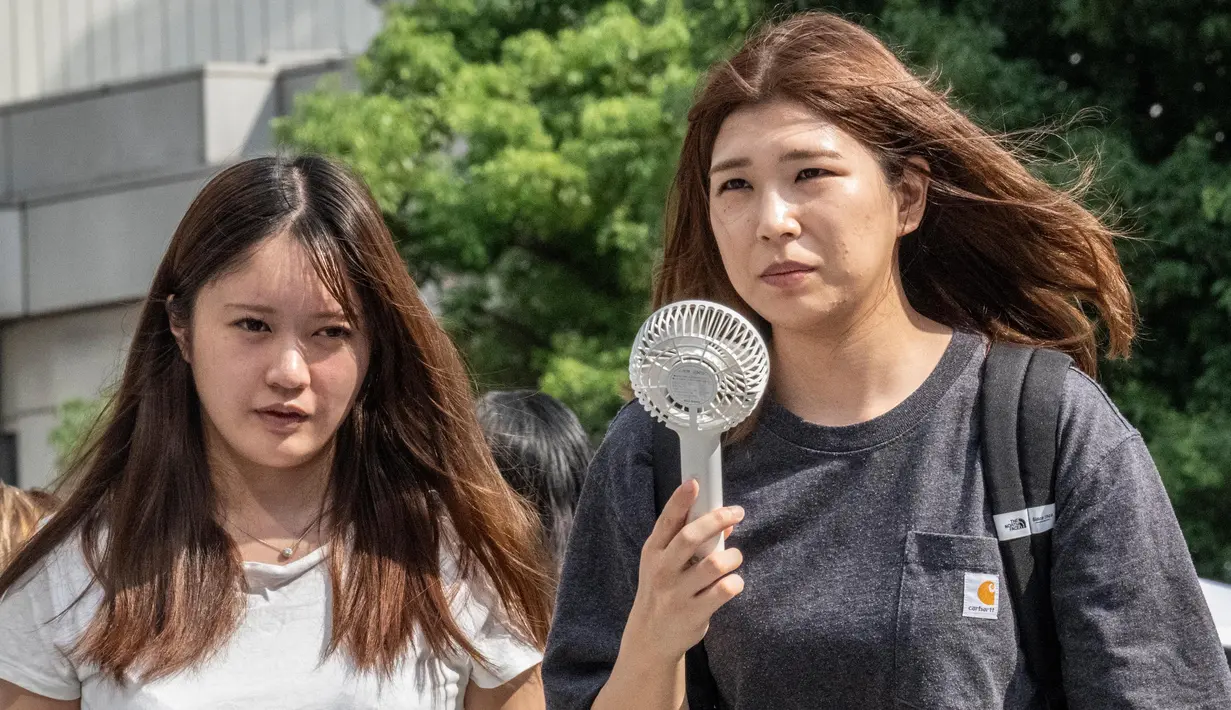 Badan Meteorologi Jepang (Japan Meteorological Agency/JMA) melaporkan pada Sabtu (14/9/2024), dari 914 lokasi pemantauan 542 di antaranya mencatat suhu 30 derajat celsius atau lebih. (Yuichi YAMAZAKI/AFP)