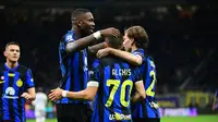 Pemain Inter Milan merayakan gol yang dicetak Alexis Sanchez dalam pertandingan melwan Empoli di Giuseppe Meazza dalam laga giornata 30 Serie A Liga Italia, Selasa (2/4/2024) dini hari WIB. Inter Milan menang 2-0 dalam pertandingan ini. (Piero CRUCIATTI / AFP)