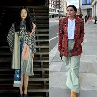 Istri Menparekraf Sandiaga Uno, Nur Asia Uno tampil memesona mengenakan kemeja putih yang dipadukan vest motif batik mega mendung, maxi skirt hitam, dan tas batik. [@nurasiauno]