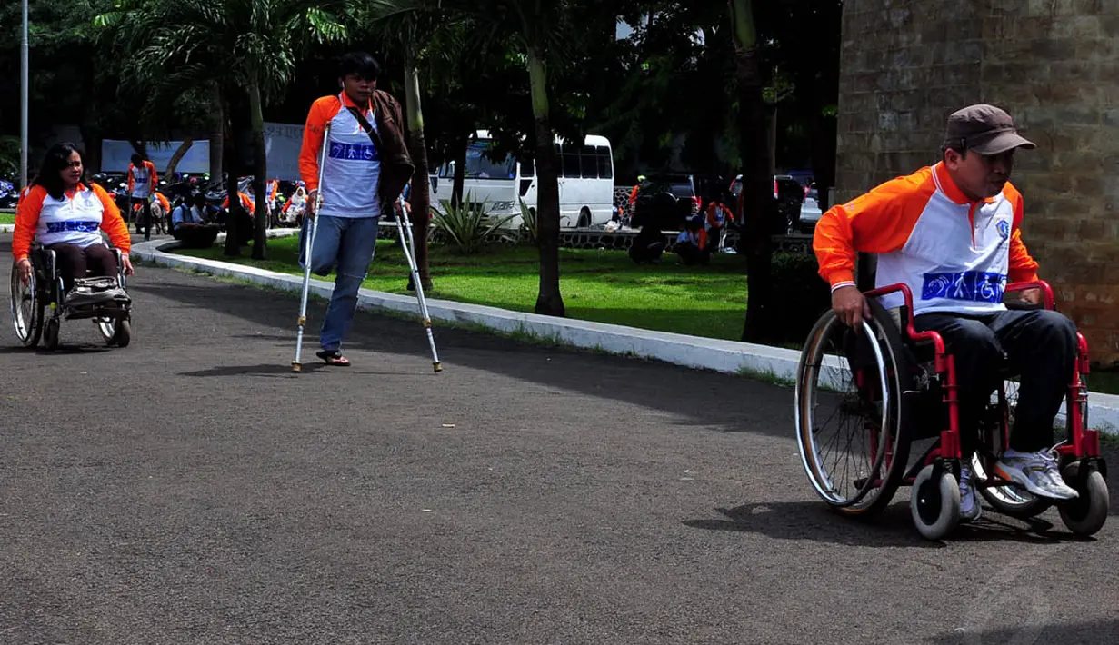 Acara yang diselenggarakan Dinas Sosial Pemprov DKI ini mengusung tema 'Pembangunan berkelanjutan disabilitas DKI Jakarta secara inklusif', Rabu (10/12/2014). (Liputan6.com/Johan Tallo)