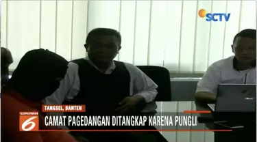 Camat Pagedangan, Achmad Kasori, ditangkap karena kedapatan lakukan pungutan liar pendirian tempat ibadah di pusat perbelanjaan.