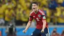 James Rodriguez berhasil mencuri perhatian di Piala Dunia 2014 Brasil dengan sepakan volley spektakuler saat melawan Uruguay. Tidak itu saja pemain asal Kolombia ini juga tercatat sebagai pencetak gol terbanyak dengan mengoleksi 6 gol. (AFP/Eitan Abramovich)