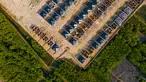 Foto udara menunjukkan pembangunan rumah-rumah yang baru merambah kawasan hutan bakau pada peringatan Hari Mangrove Sedunia di Banda Aceh pada 26 Juli 2025. (CHAIDEER MAHYUDDIN/AFP)