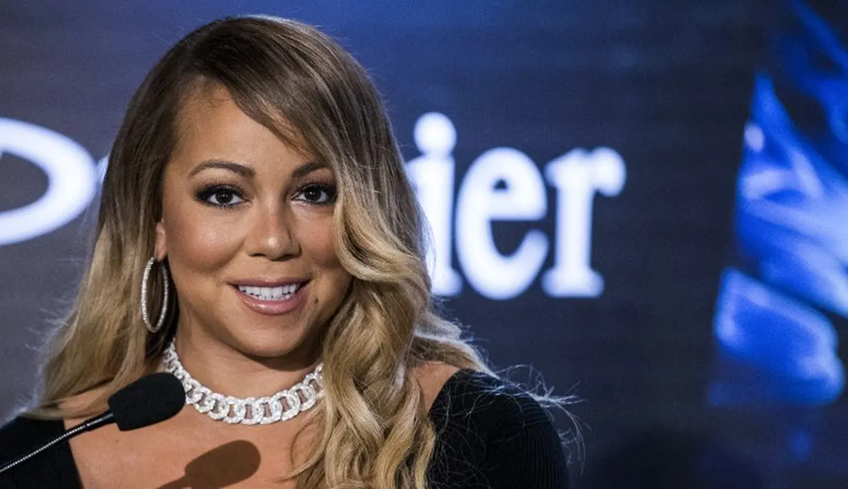 Mariah Carey menikah dengan Nick Cannon pada 30 April 2008 setelah berpacaran selama satu bulan. (JACK GUEZ / AFP)