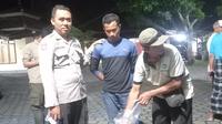 Pelaku perburuan liar di Taman Nasional Meru Betiri diamankan polisi beserta barang buktinya (Istimewa)