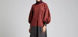 Ilustrasi Tunik Batik Lengan Balon (Sumber Gambar: Meta AI)