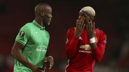 Pogba yang berseragam MU akan menghadapi sang kakak, Florentin yang merupakan bek St. Etienne. Keduanya pun bertekad untuk membawa klubnya masing-masing meraih kemenangan. (AP/Dave Thompson)