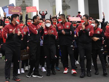 Presiden Joko Widodo atau Jokowi mengapresiasi kiprah atlet-atlet Indonesia di SEA Games 2021 yang meraih medali emas, perak, dan perunggu. Pemerintah pun memberi apresiasi pencapaian itu dengan memberi bonus. (Foto: Biro Pers Sekretariat Presiden/Lukas)