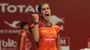 Teriakan keras saat meraih poin menjadi ciri khas Carolina Marin. (Bola.com/Arief Bagus)