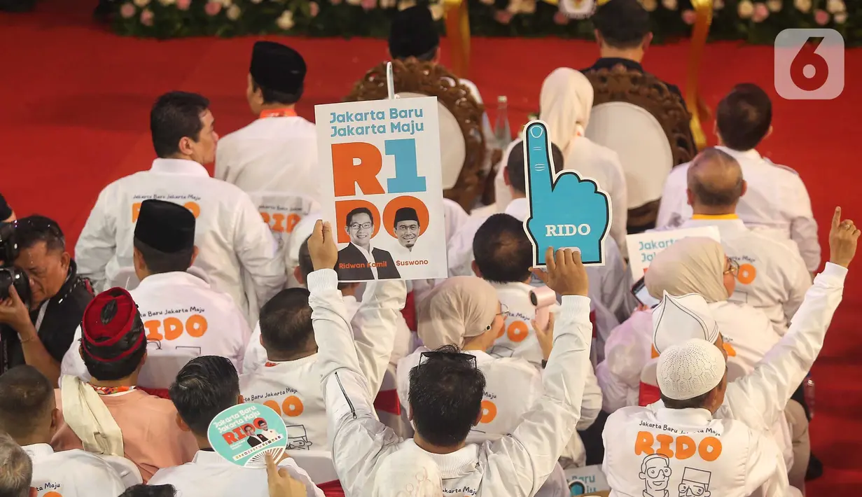 Pada Senin (23/9/2024) malam, Komisi Pemilihan Umum (KPU) Provinsi DKI Jakarta menggelar siding pleno terbuka untuk melakukan pengundian nomor urut pasangan calon. (Liputan6.com/Angga Yuniar)