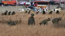 Seorang juru bicara maskapai mengatakan penyebab kecelakaan pesawat masih diselidiki termasuk jumlah korban tewas. (JUNG YEON-JE/AFP)
