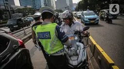 Namun, kebijakan ini hanya dilakukan di wilayah yang tak terjangkau Electronic Traffic Law Enforcement (ETLE). (Liputan6.com/Faizal Fanani)