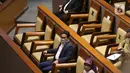 Menteri Desa, Pembangunan Daerah Tertinggal, dan Transmigrasi (Mendes PDTT) Abdul Halim Iskandar saat mengikuti sidang paripurna ke-14 masa persidangan III tahun sidang 2021-2022 di Nusantara II, Kompleks Parlemen MPR/DPR-DPD, Senayan, Jakarta, Selasa (8/2/2022). (Liputan6.com/Angga Yuniar)