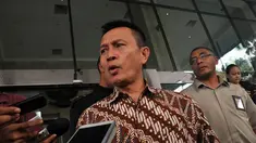 Ketua Komisi Yudisial (KY) Suparman Marzuki mendatangi kantor KPK, Jakarta, Senin (6/10/14). (Liputan6.com/Miftahul Hayat)